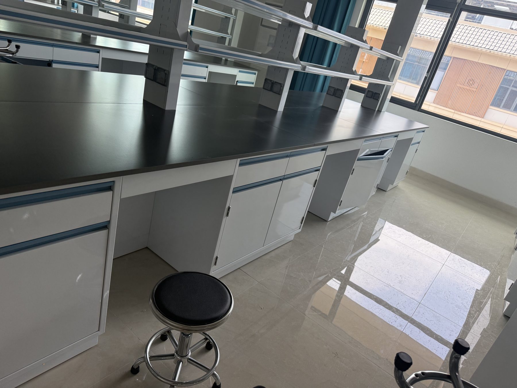 Laboratory bench detail with alternating storage modules and open knee spaces