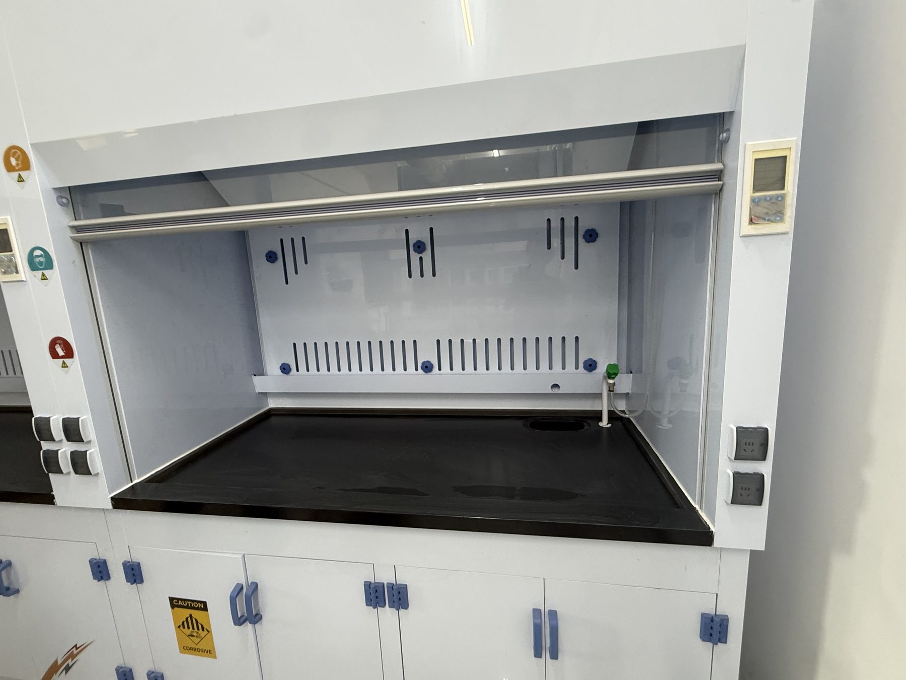 Laboratory fume hood with black work surface