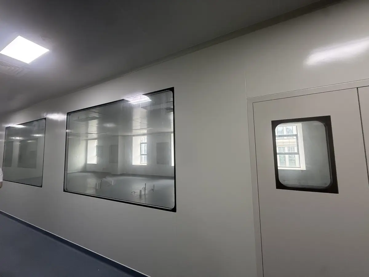 Cleanroom laboratory with island bench and fume hood