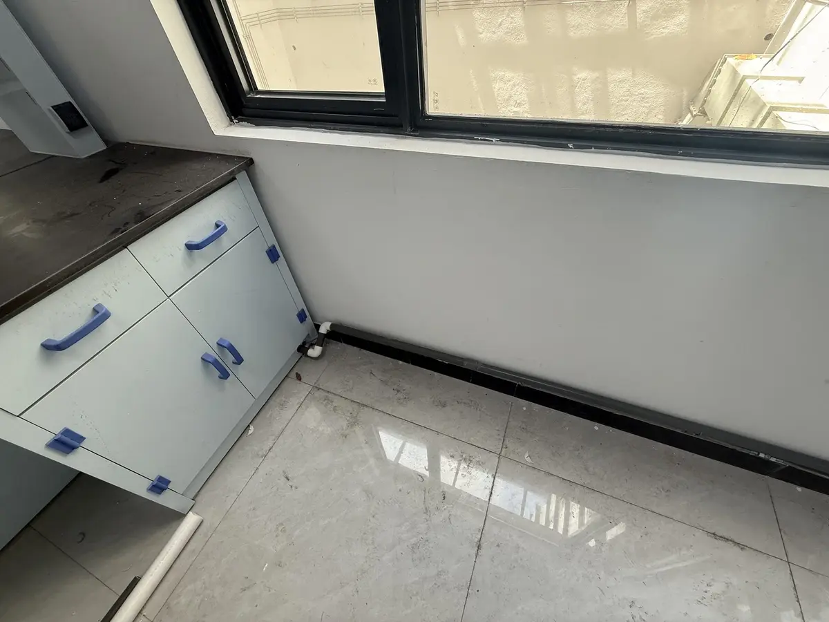 Blue laboratory base cabinets and utility connection