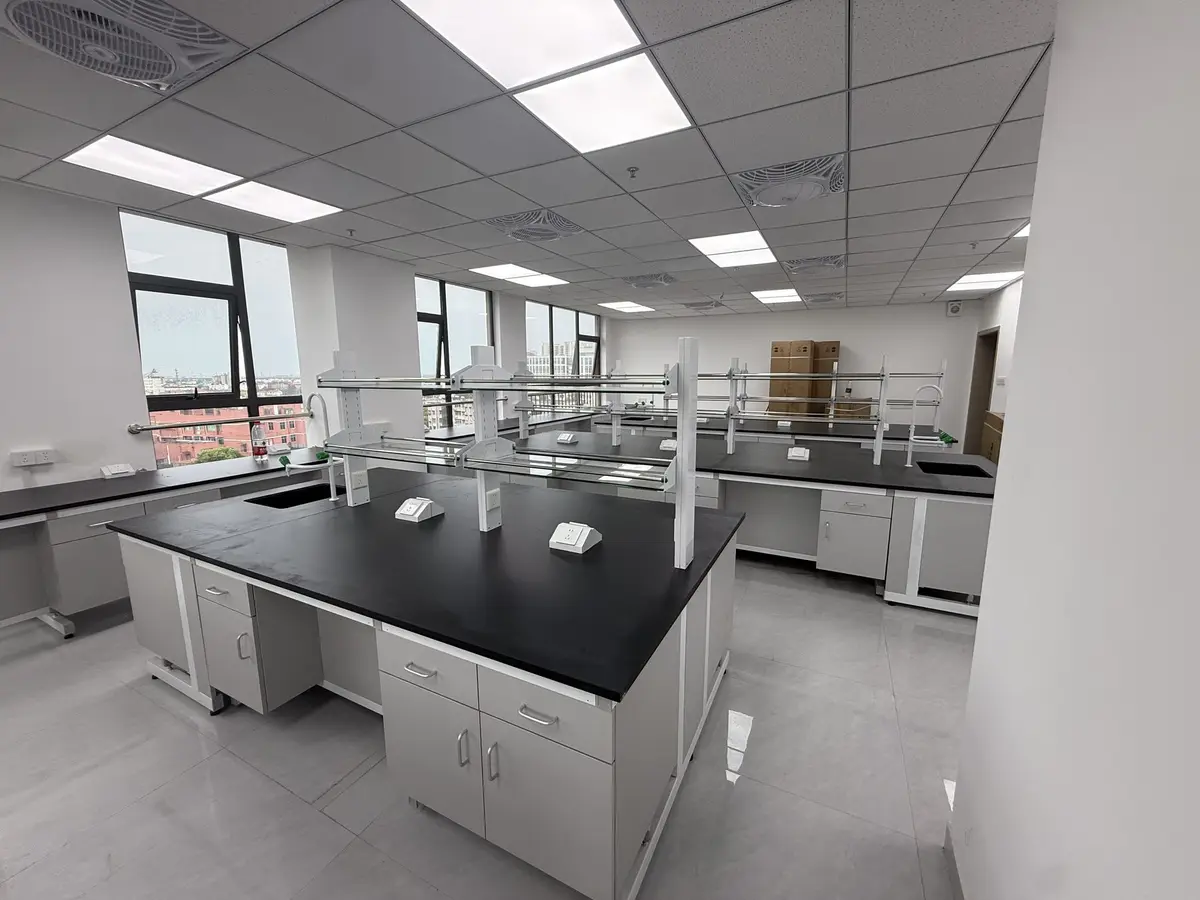 Completed laboratory room showing island benches, wall benches, services, and circulation for site-survey planning